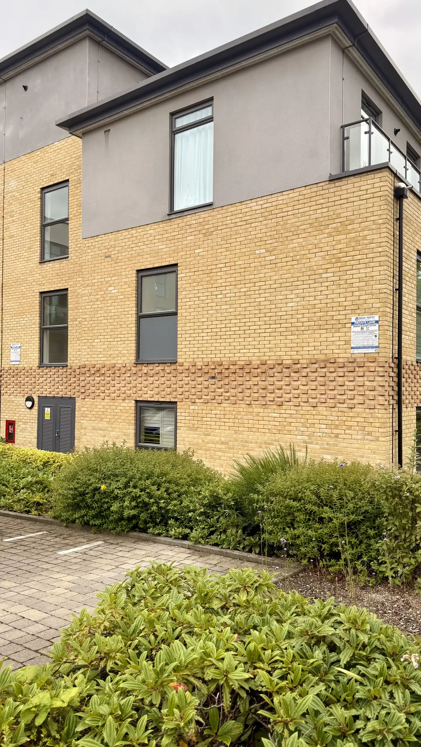 Exterior view of a modern care home, inviting and well-maintained.