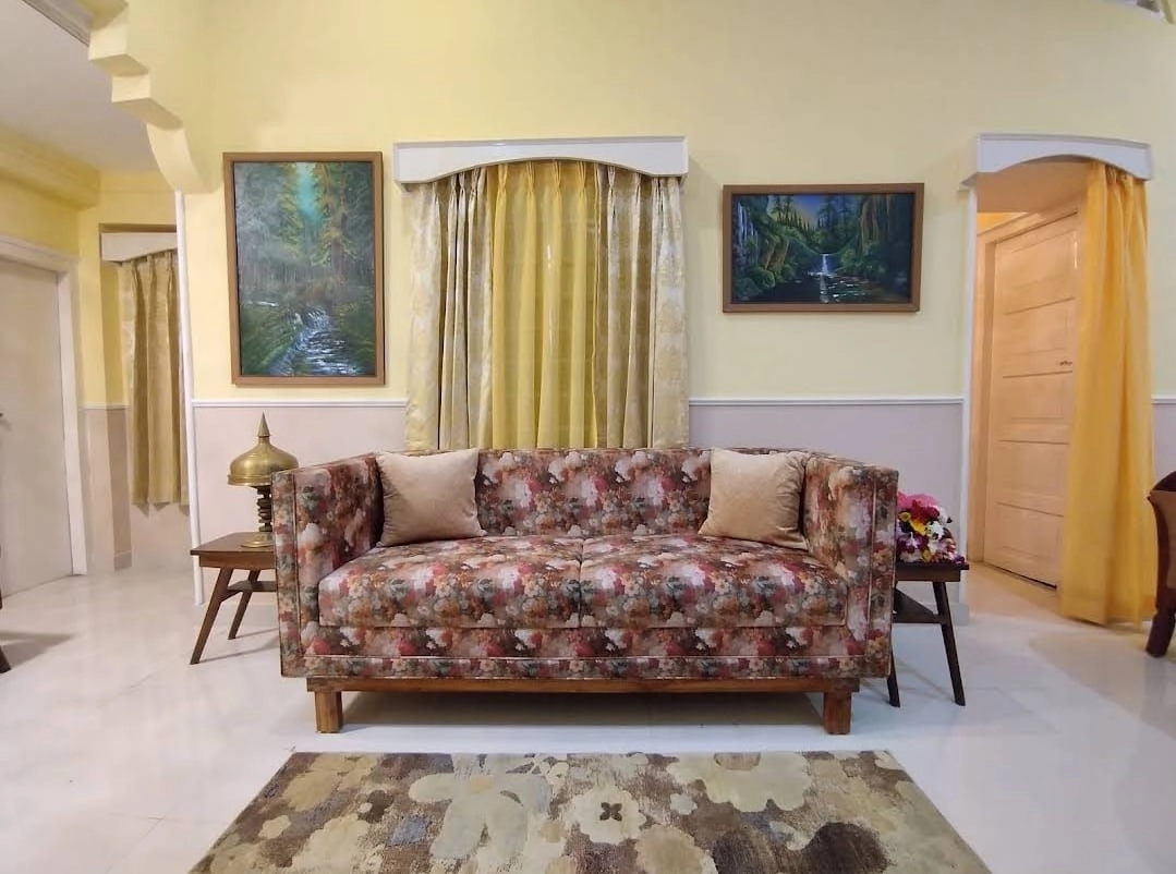 Comfortable guest room with natural light